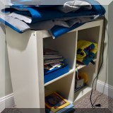F38. White square cubby shelves. 